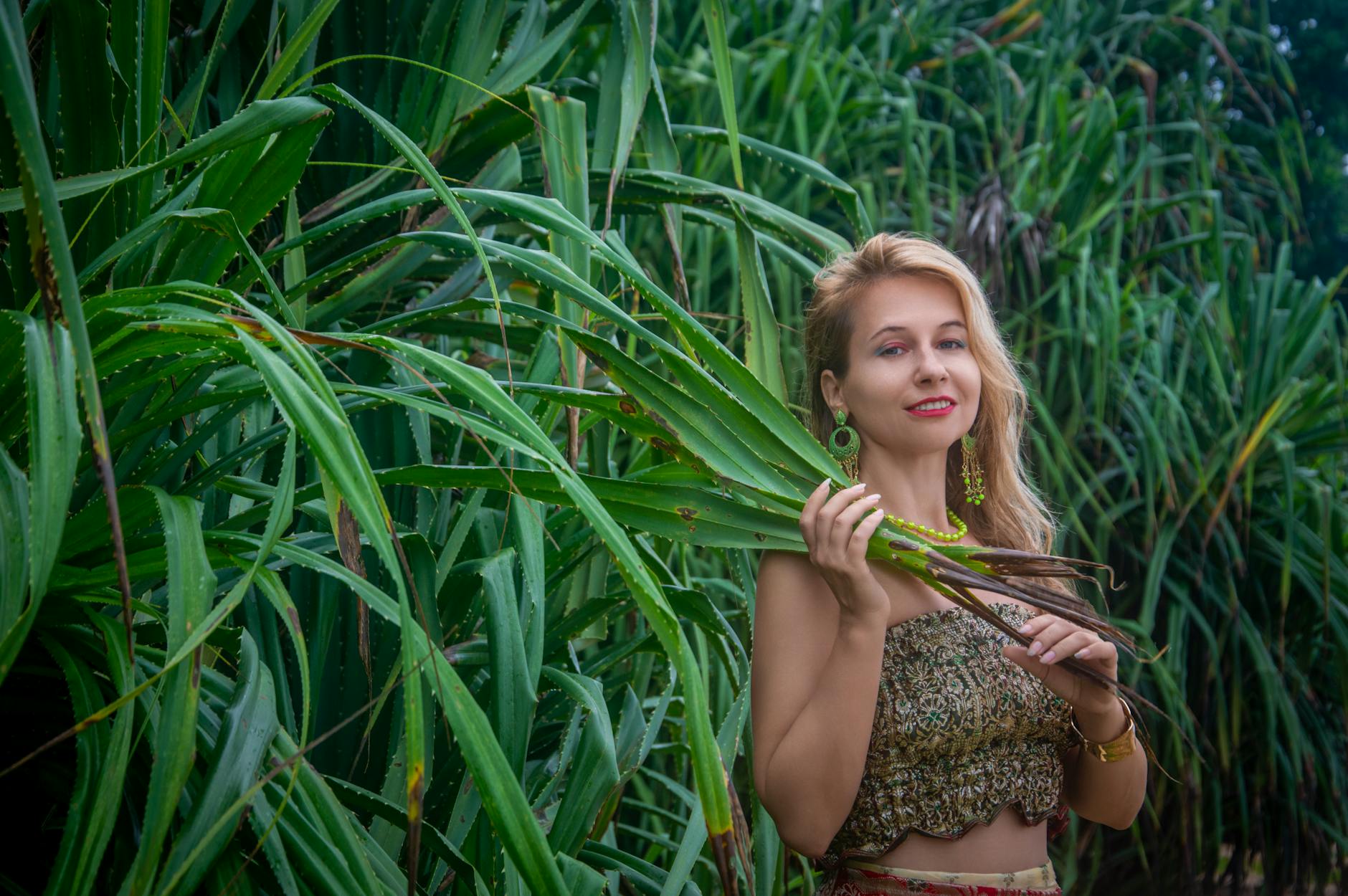 A woman relaxes with closed eyes, showcasing flawless glowing skin and healthy complexion in a serene spa-like atmosphere.